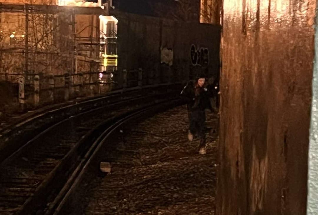Running back from the lower level before a train passes by