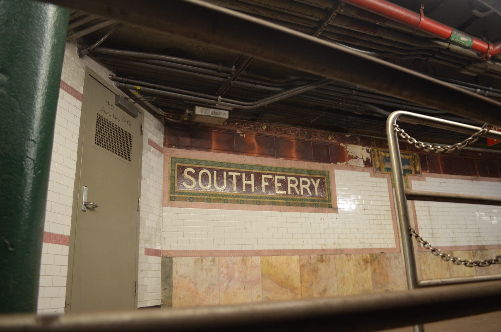 A look of the SOUTH FERRY station name on the wall